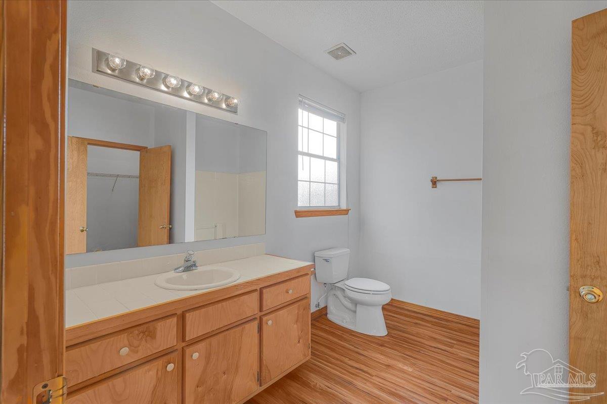 6500 Winston Brown Road Milton, FL 32570 - Photo 26 of 43 a bathroom with a sink and a mirror