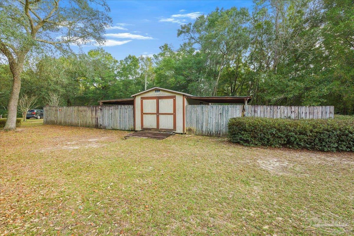 6500 Winston Brown Road Milton, FL 32570 - Photo 39 of 43 a house view with a outdoor space