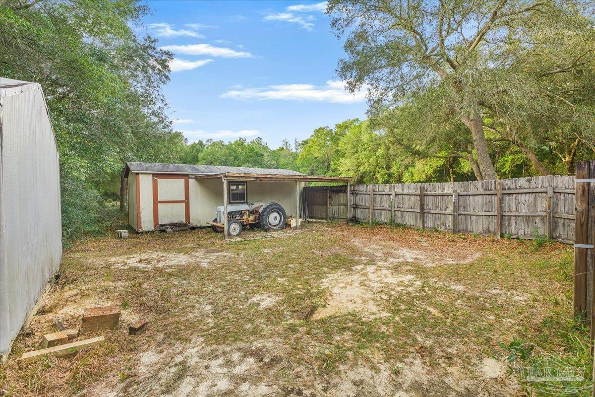 6500 Winston Brown Road Milton, FL 32570 - Photo 40 of 43 a view of a backyard