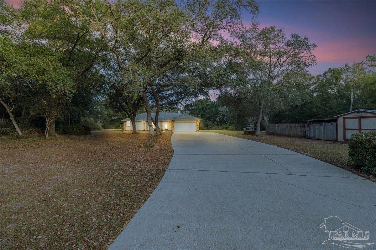 6500 Winston Brown Road Milton, FL 32570 - Photo 4 of 43 a view of backyard with green space