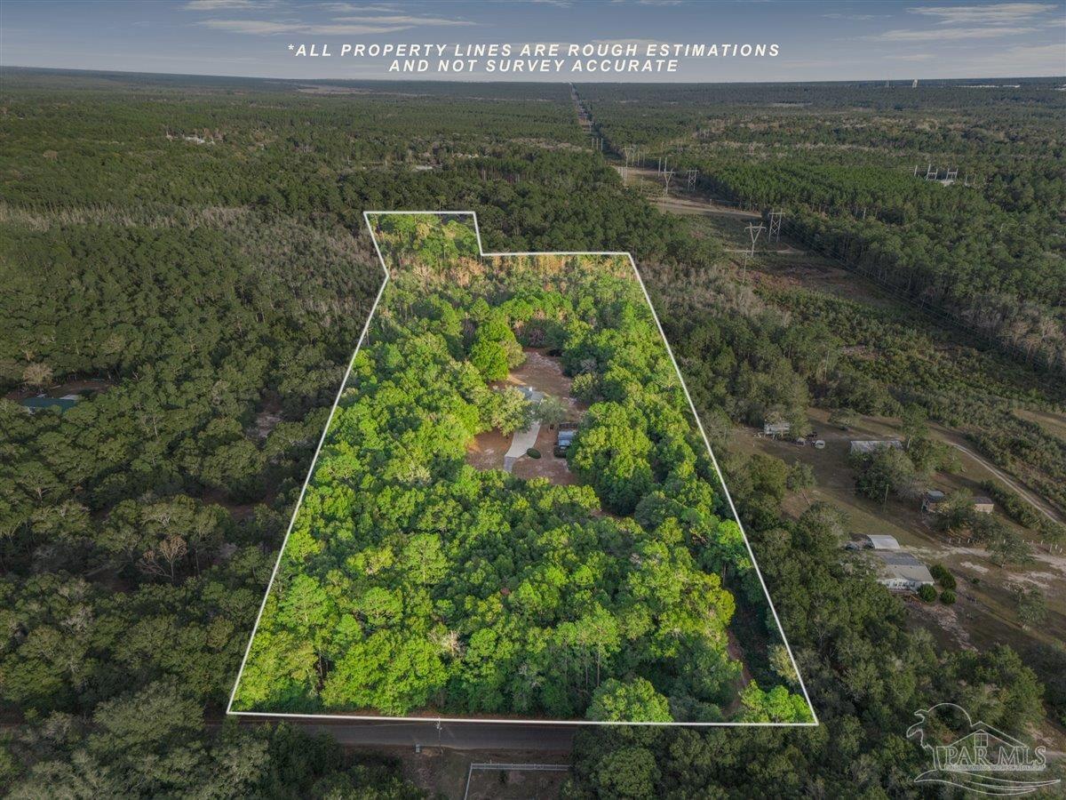 6500 Winston Brown Road Milton, FL 32570 - Photo 7 of 43 a view of a garden