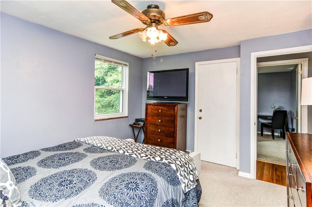 879 Rosalind Road Pittsburgh, PA 15237 - Photo 14 of 25 Master bedroom has overhead ceiling fan with lighting! Closet is tucked away to keep the flow of the room and wall space open and available for your furniture.