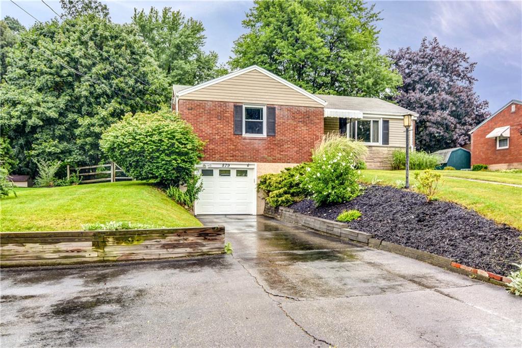 879 Rosalind Road Pittsburgh, PA 15237 - Photo 3 of 25 Beautifully landscaped level yard and extended parking pad for your guests.
