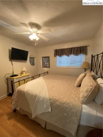a kitchen with stainless steel appliances wooden cabinets and a stove top oven