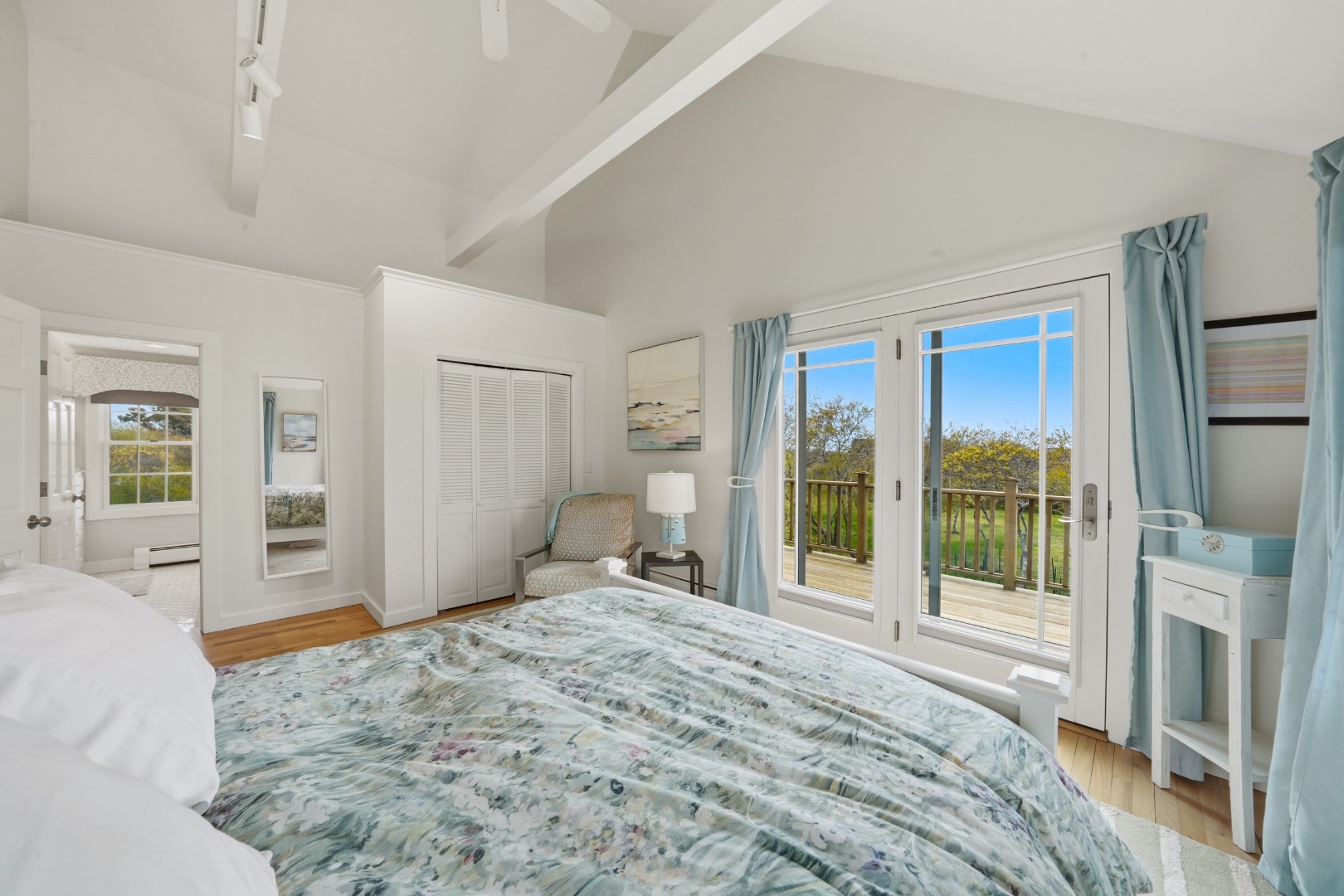 4 Flintlock Road Nantucket, MA 02554 - Photo 22 of 62 primary bedroom with doors to private deck