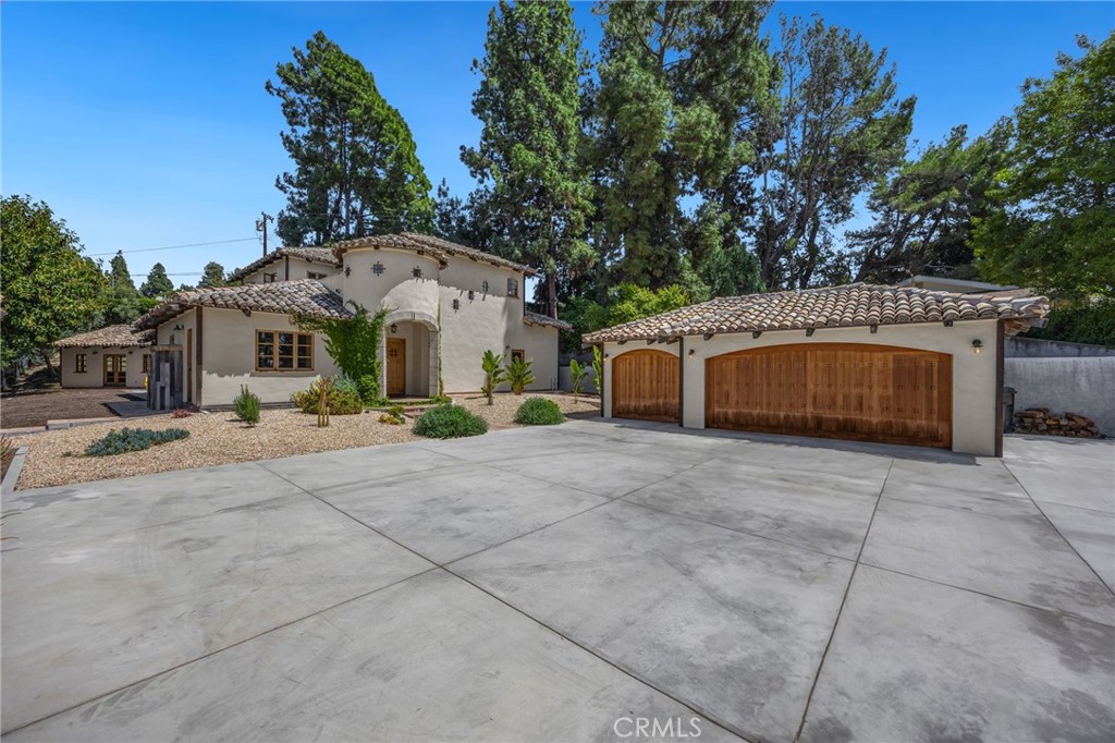 911 Laguna Road Fullerton, CA 92835 - Photo 11 of 68 a front view of a house with a yard