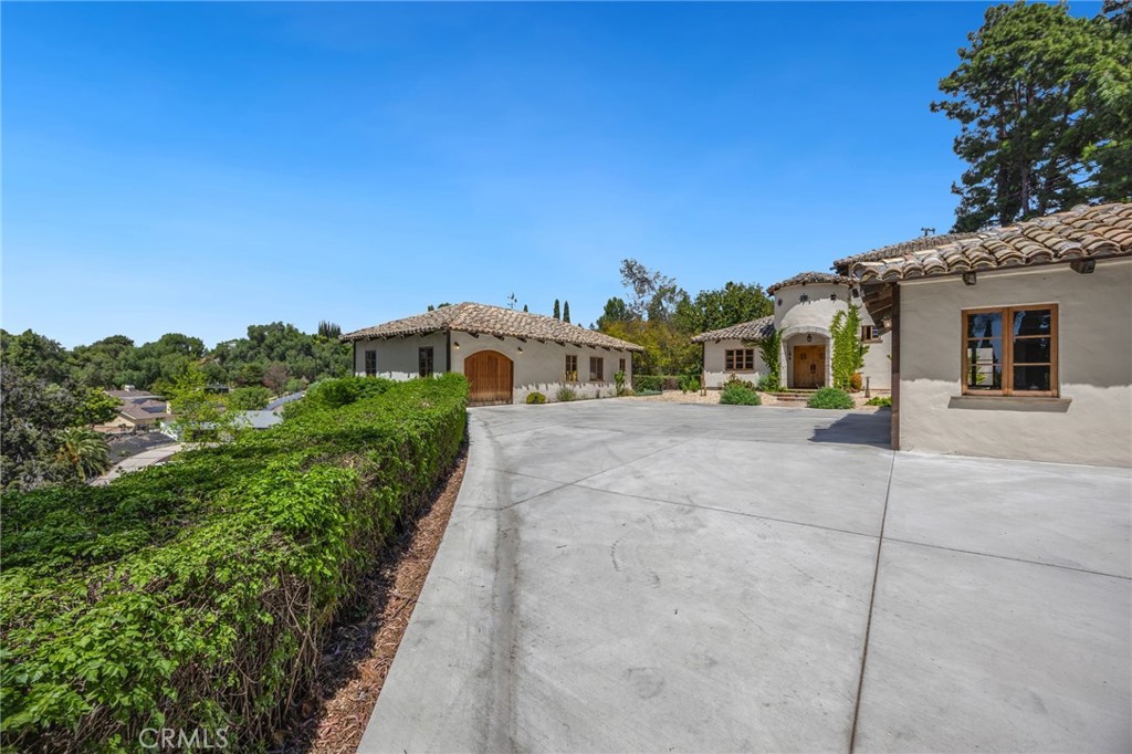 911 Laguna Road Fullerton, CA 92835 - Photo 12 of 68 a view of a house with a yard