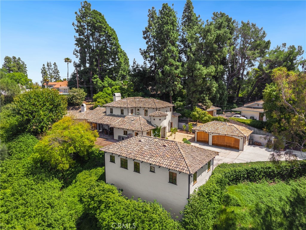 911 Laguna Road Fullerton, CA 92835 - Photo 19 of 68 an aerial view of residential house with outdoor space and trees around