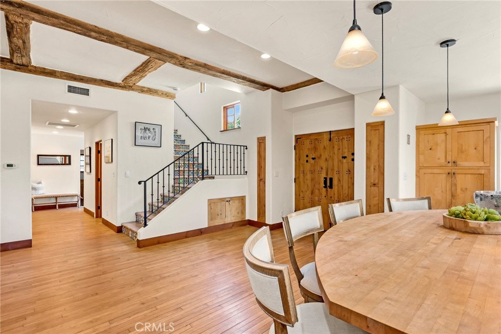911 Laguna Road Fullerton, CA 92835 - Photo 25 of 68 a view of a room with wooden floor and windows