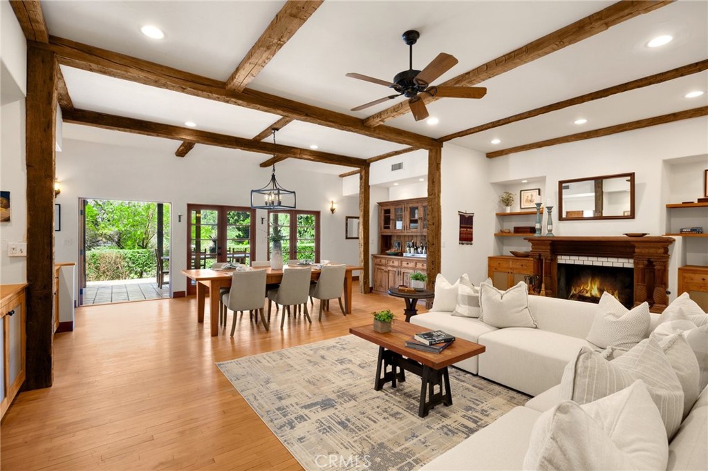 911 Laguna Road Fullerton, CA 92835 - Photo 29 of 68 a living room with furniture a fireplace and a large window