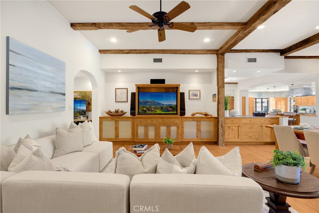 911 Laguna Road Fullerton, CA 92835 - Photo 30 of 68 a living room with furniture and a chandelier