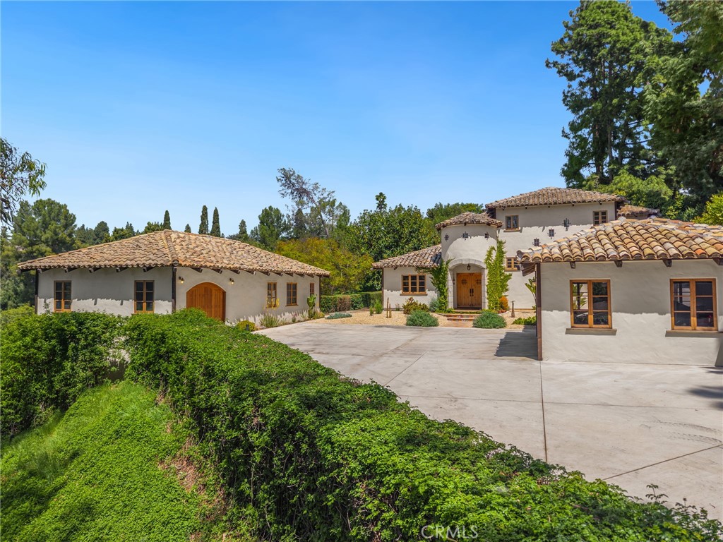911 Laguna Road Fullerton, CA 92835 - Photo 3 of 68 a front view of a house with a yard