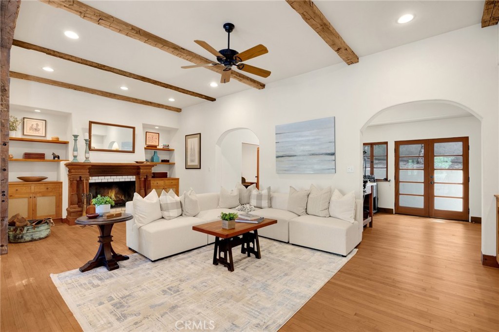 911 Laguna Road Fullerton, CA 92835 - Photo 31 of 68 a living room with furniture and a fireplace