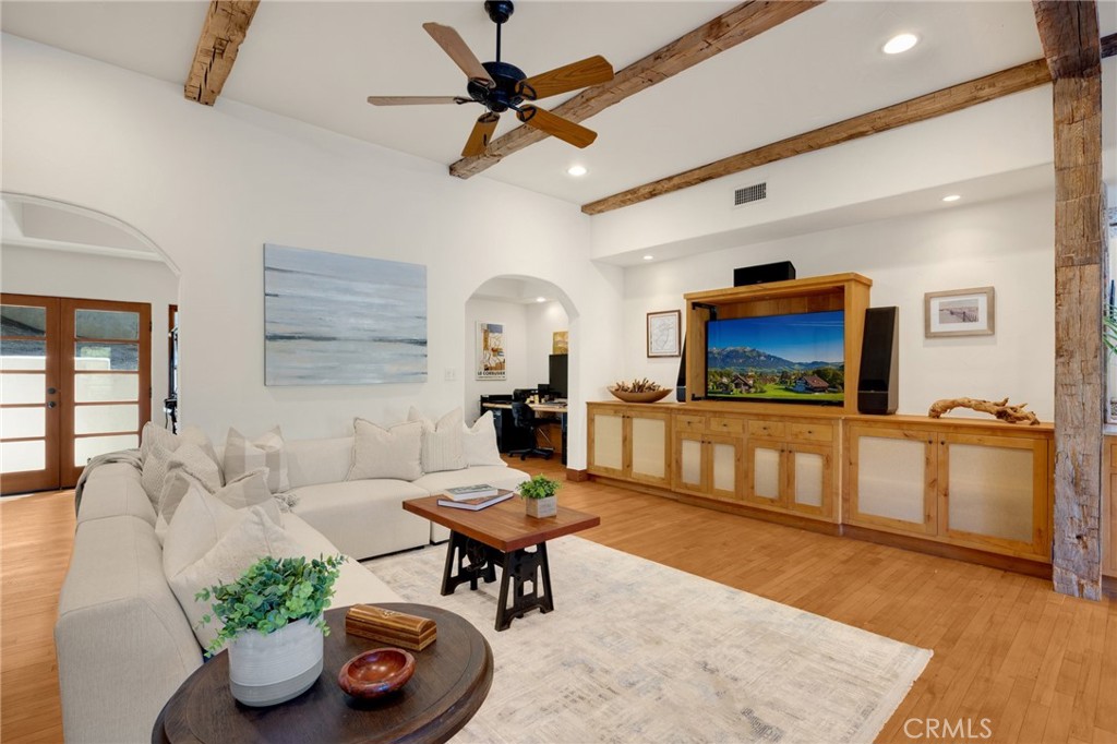 911 Laguna Road Fullerton, CA 92835 - Photo 33 of 68 a living room with furniture and a flat screen tv