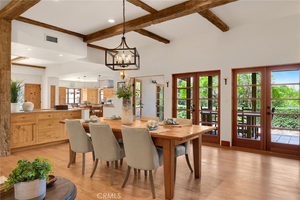 911 Laguna Road Fullerton, CA 92835 - Photo 34 of 68 a view of a dining room with furniture window and wooden floor