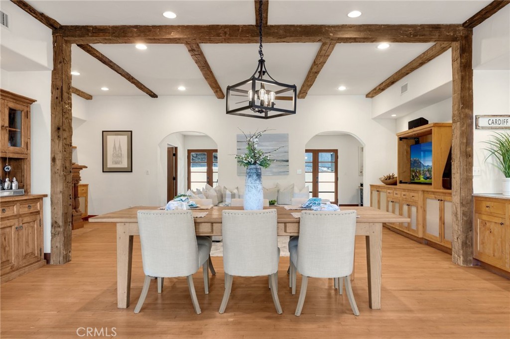 911 Laguna Road Fullerton, CA 92835 - Photo 37 of 68 a view of a dining room with furniture window and wooden floor