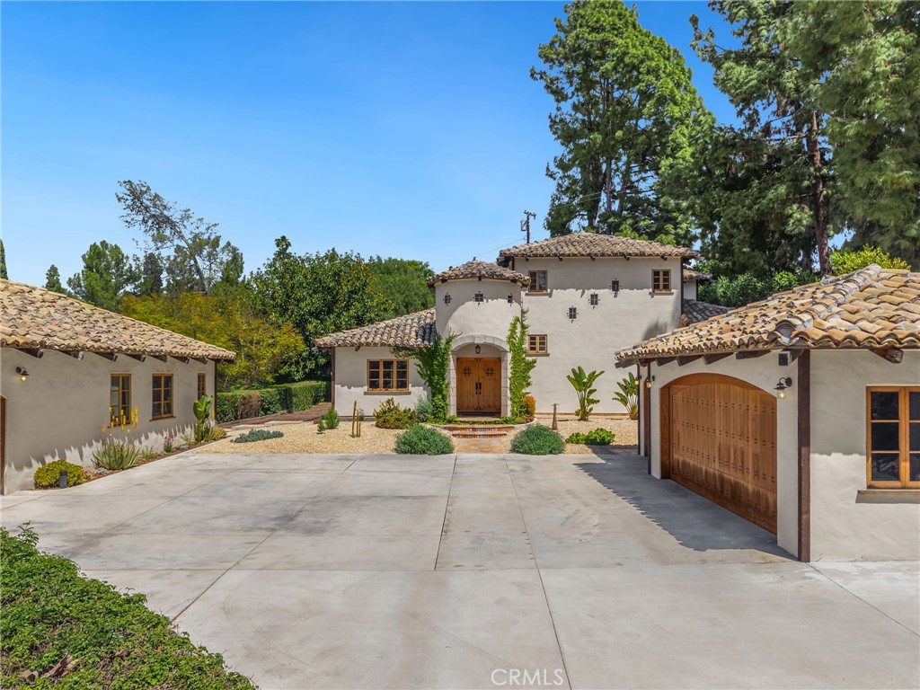 911 Laguna Road Fullerton, CA 92835 - Photo 5 of 68 a front view of a house with a outdoor seating