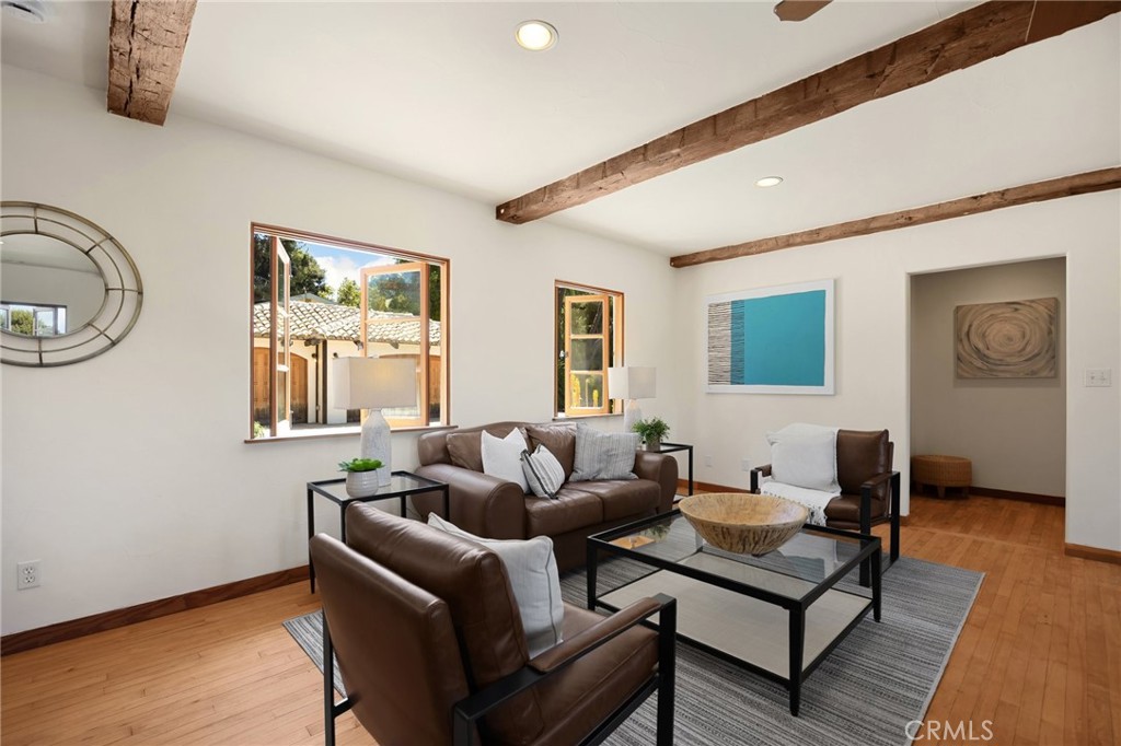 911 Laguna Road Fullerton, CA 92835 - Photo 63 of 68 a living room with furniture and wooden floor