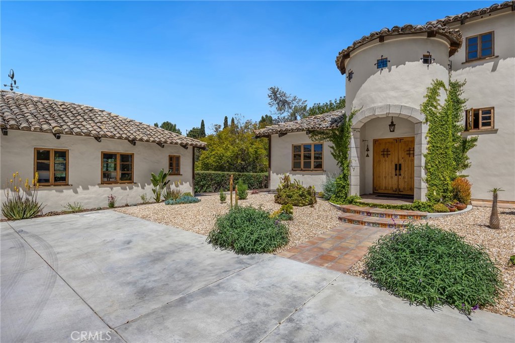 911 Laguna Road Fullerton, CA 92835 - Photo 7 of 68 front view of a house with a yard