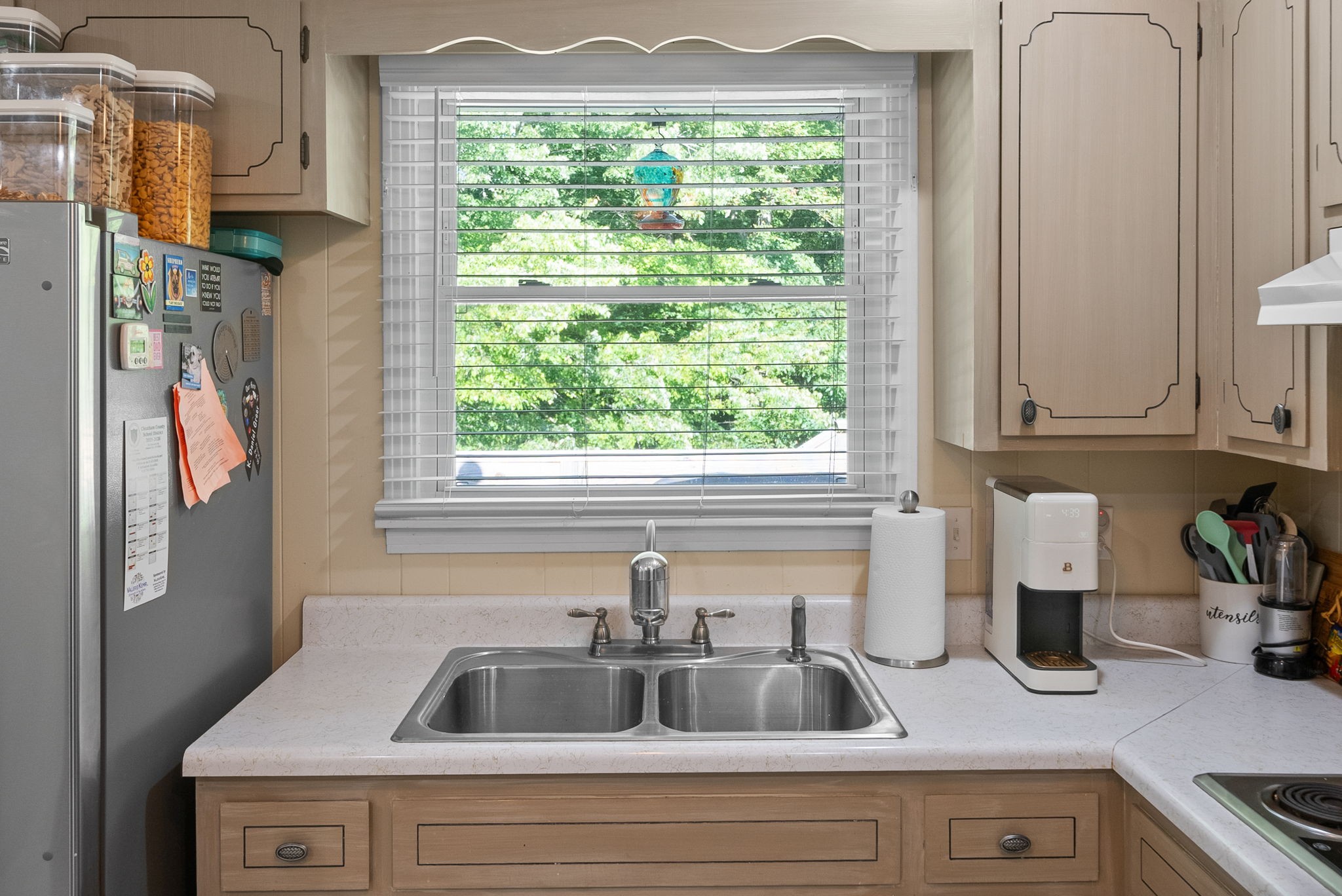 1001 Issac Clifton Road Chapmansboro, TN 37035 - Photo 14 of 47 a kitchen with a sink and a window
