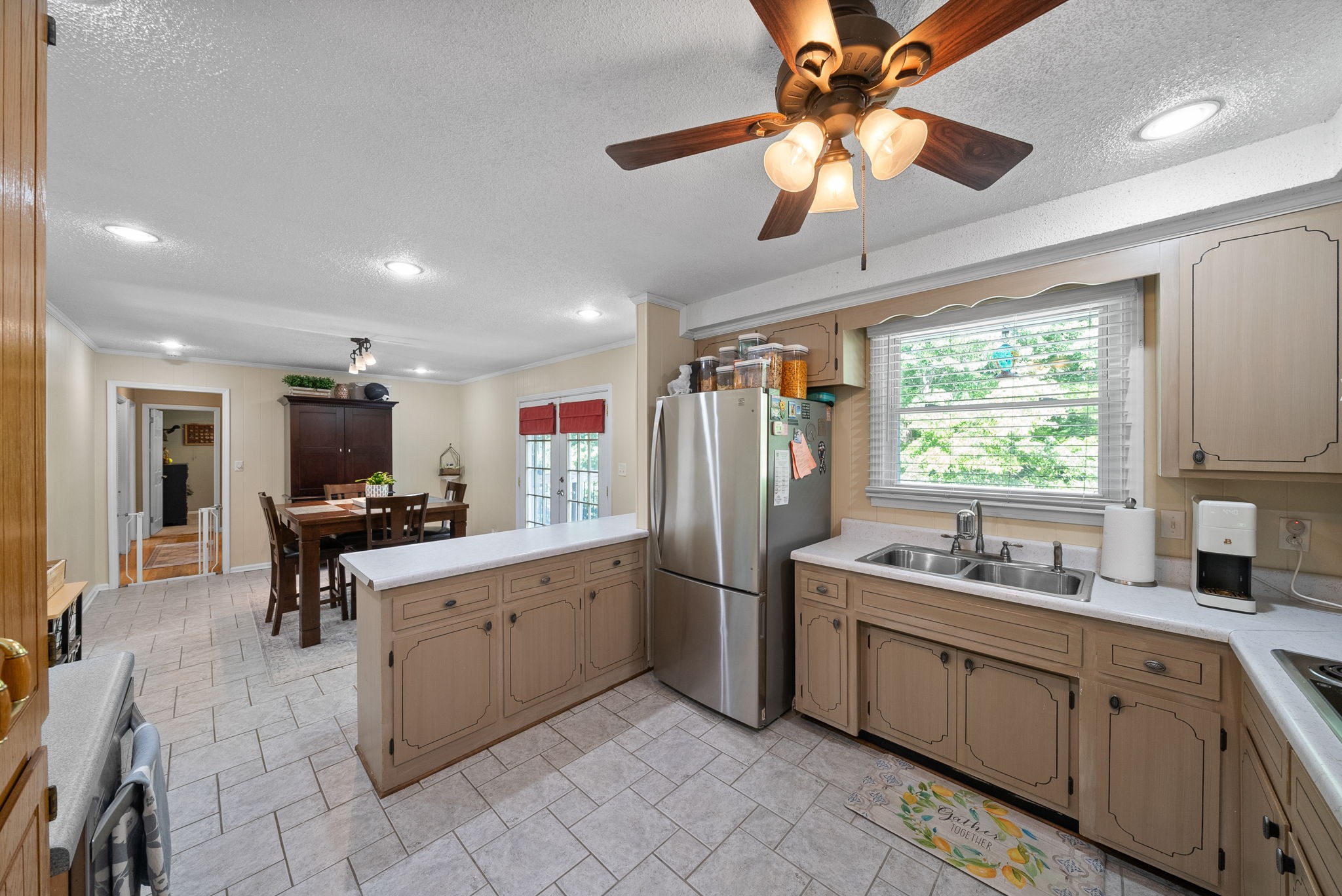 1001 Issac Clifton Road Chapmansboro, TN 37035 - Photo 15 of 47 a kitchen with sink cabinets and window
