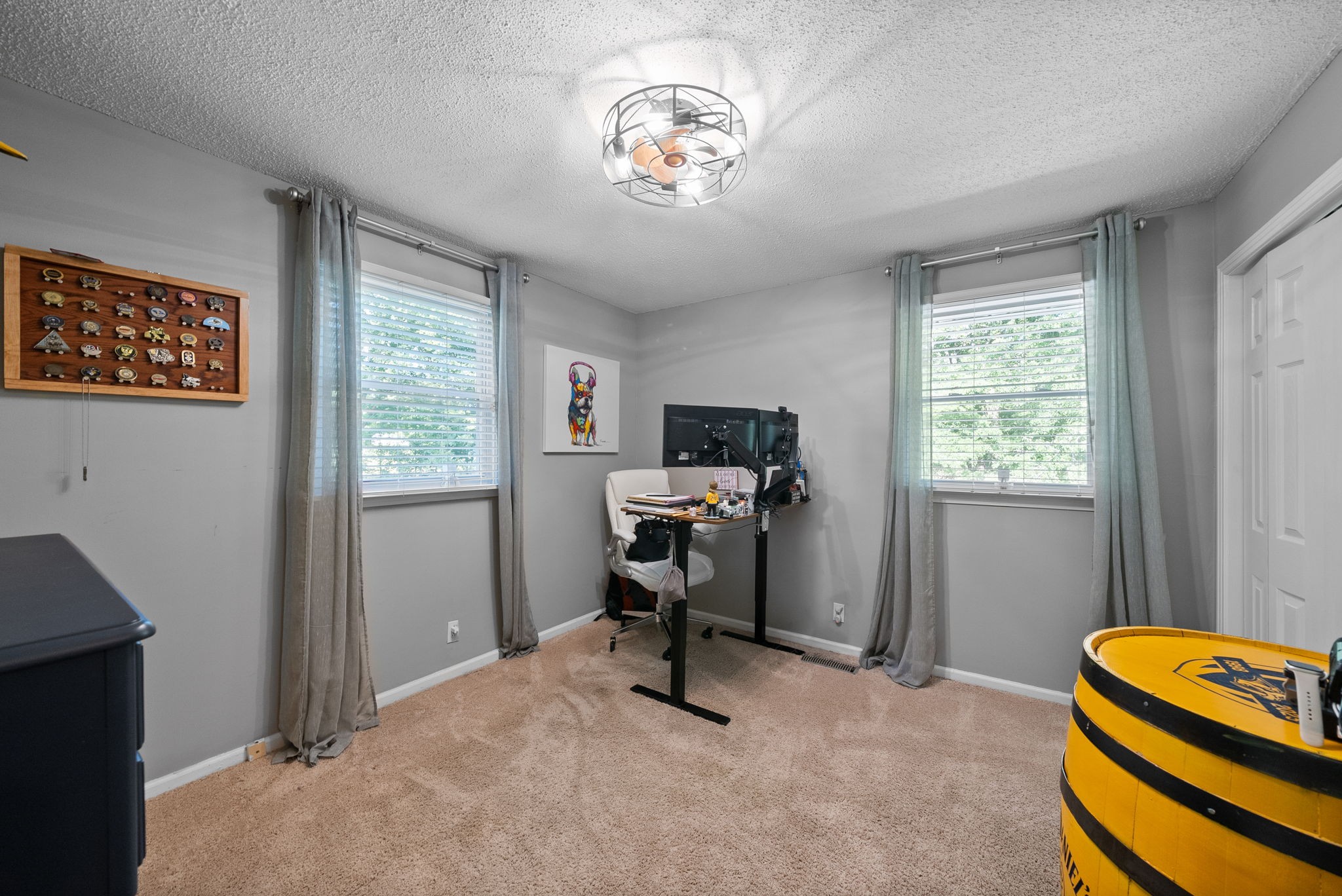 1001 Issac Clifton Road Chapmansboro, TN 37035 - Photo 19 of 47 a view of a workspace with furniture and a window