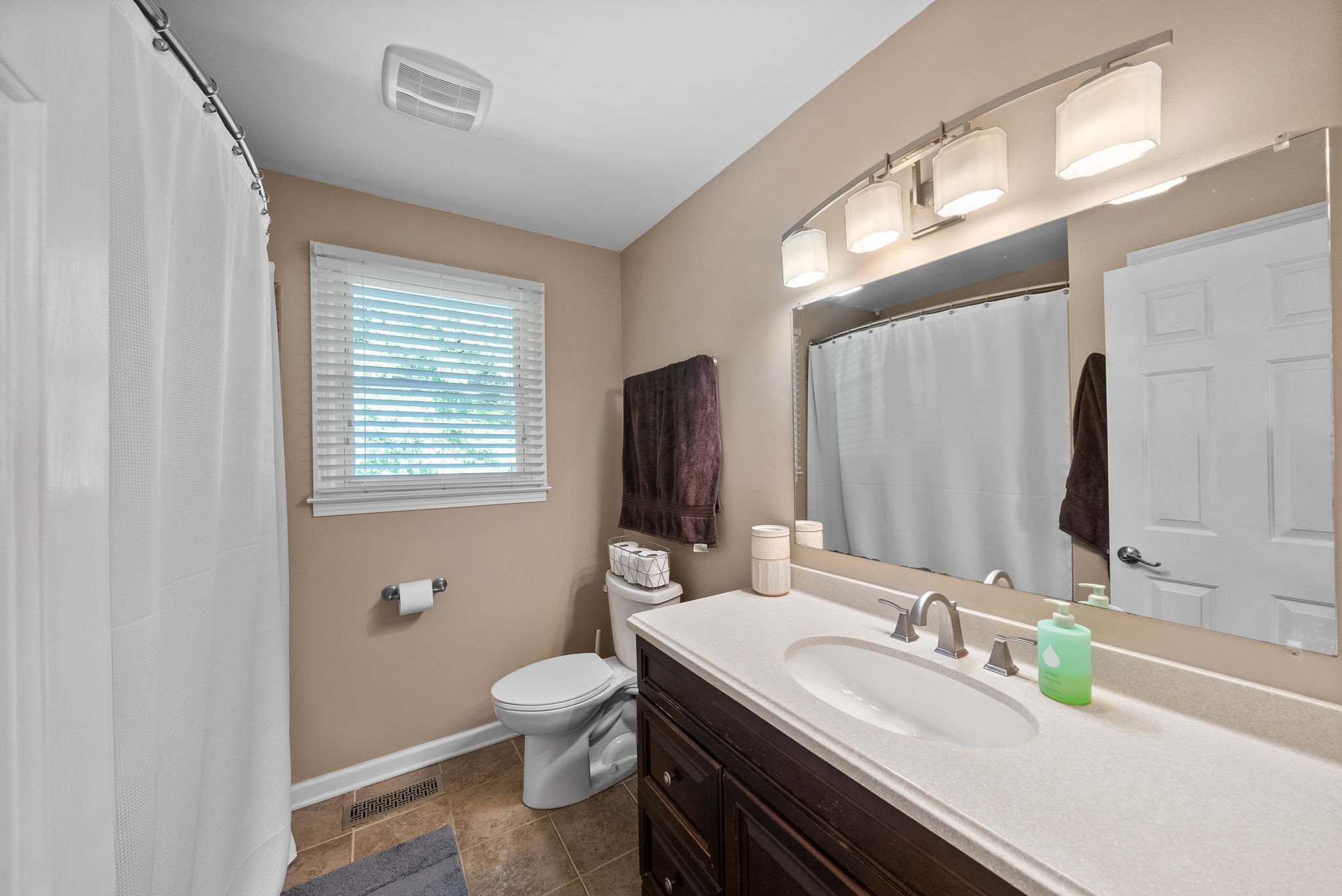 1001 Issac Clifton Road Chapmansboro, TN 37035 - Photo 21 of 47 a bathroom with a granite countertop double vanity sink mirror and toilet
