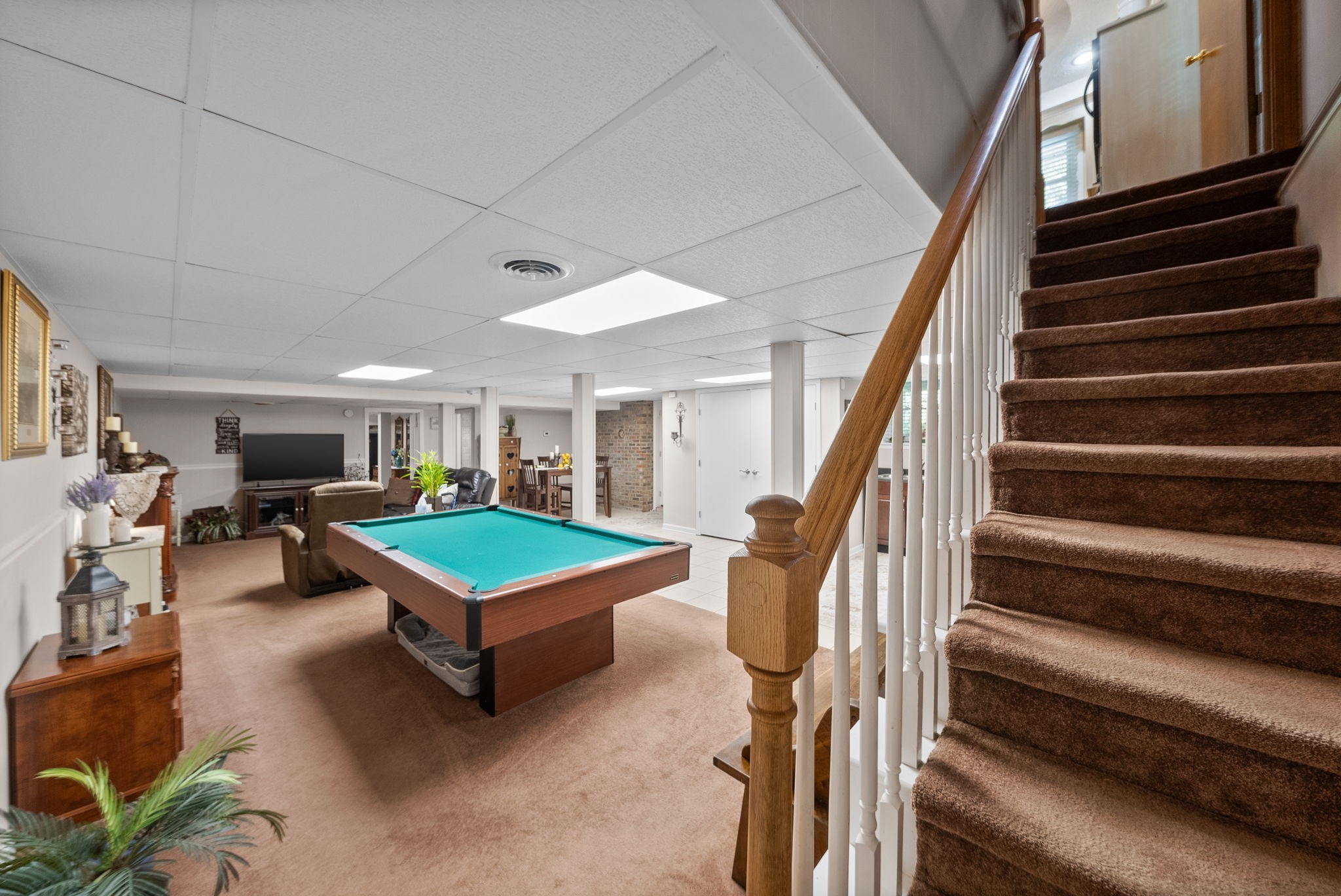 1001 Issac Clifton Road Chapmansboro, TN 37035 - Photo 25 of 47 a room with lots of furniture and windows