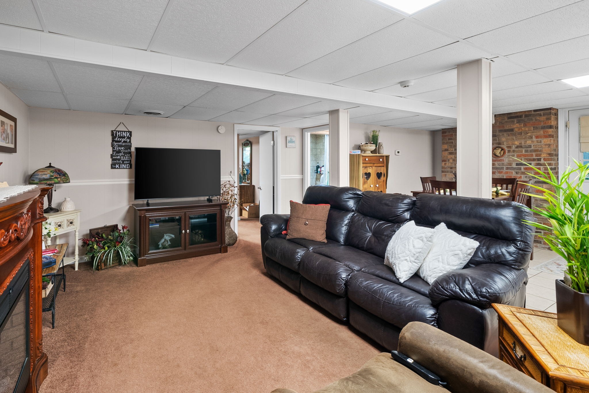 1001 Issac Clifton Road Chapmansboro, TN 37035 - Photo 34 of 47 a living room with furniture and a flat screen tv