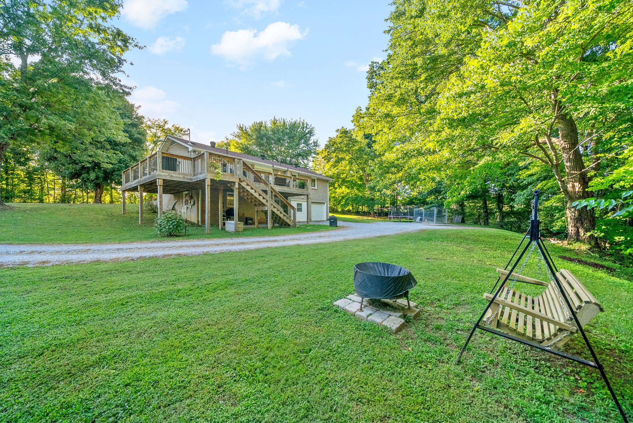 1001 Issac Clifton Road Chapmansboro, TN 37035 - Photo 44 of 47 a view of a garden with a slide