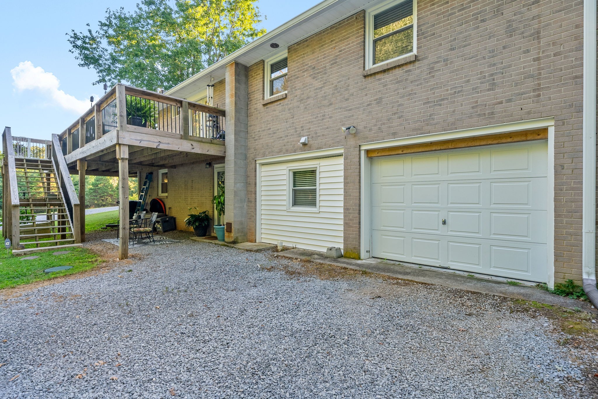 1001 Issac Clifton Road Chapmansboro, TN 37035 - Photo 47 of 47 a view of a house with a backyard