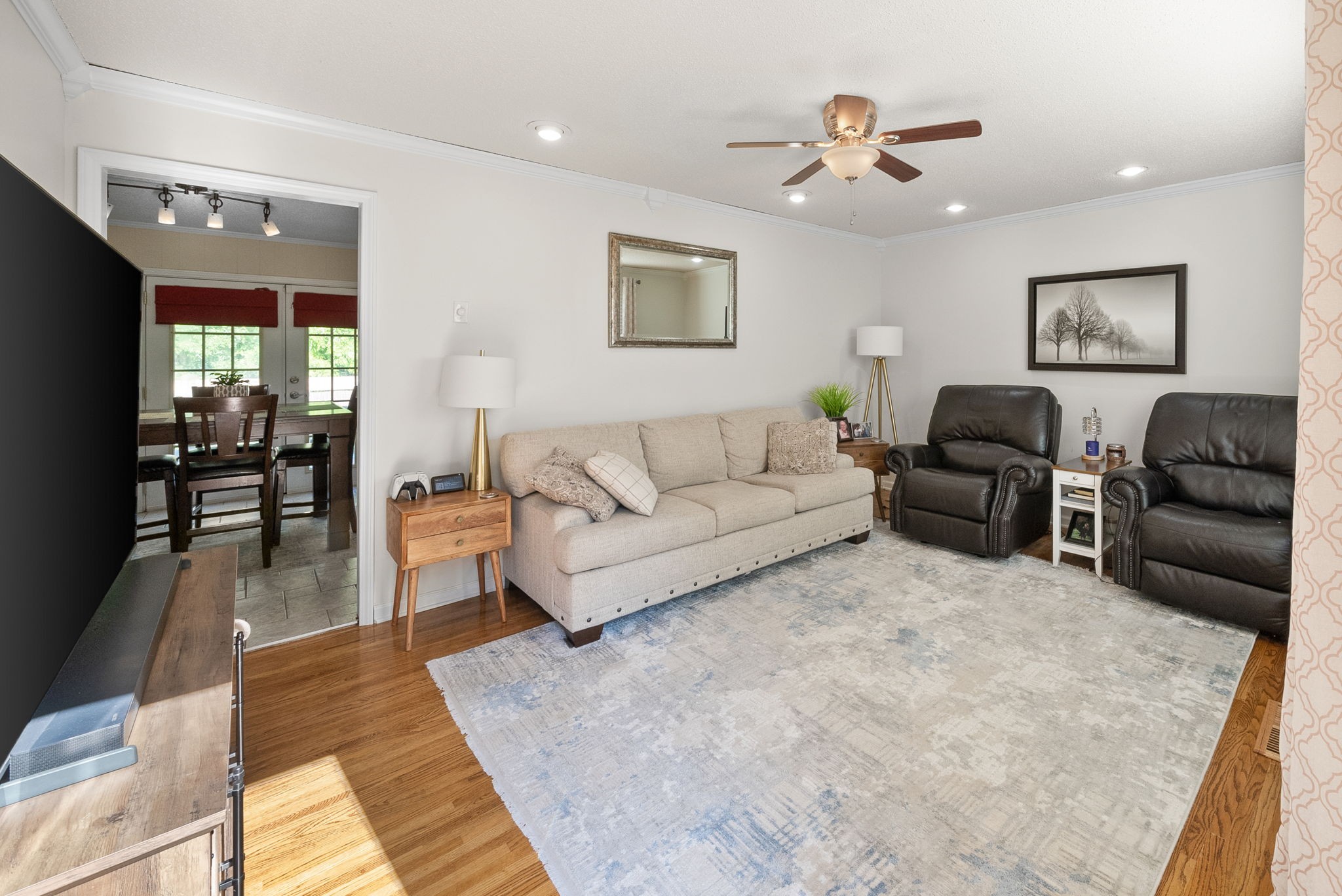 1001 Issac Clifton Road Chapmansboro, TN 37035 - Photo 7 of 47 a living room with furniture and wooden floor