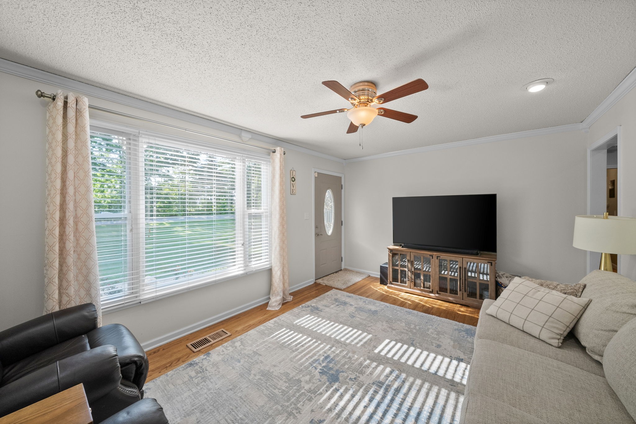 1001 Issac Clifton Road Chapmansboro, TN 37035 - Photo 9 of 47 a bedroom with a bed and a flat screen tv
