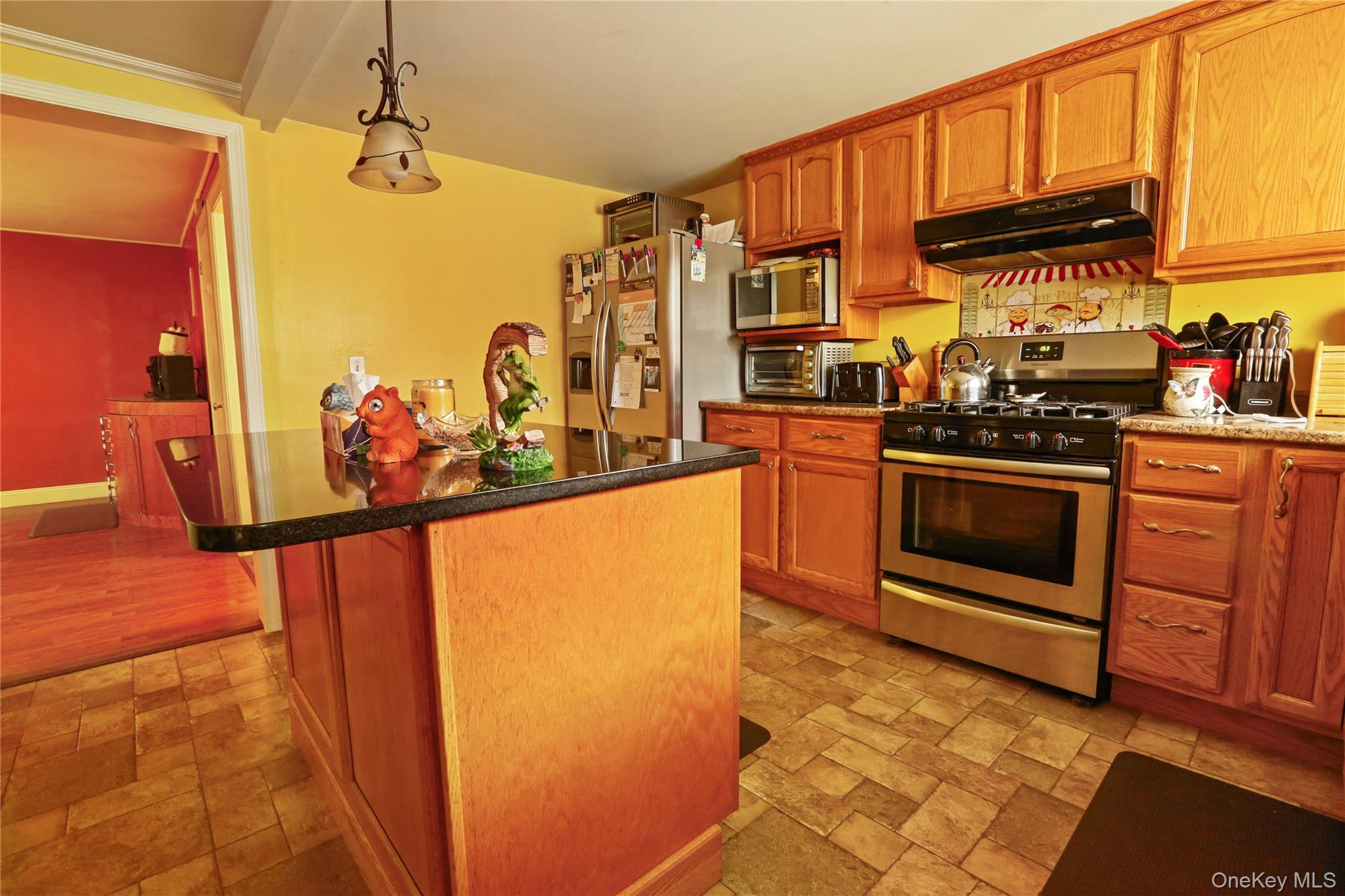 650 Granite Road Kerhonkson, NY 12446 - Photo 12 of 38 a kitchen with stainless steel appliances granite countertop a stove and a refrigerator