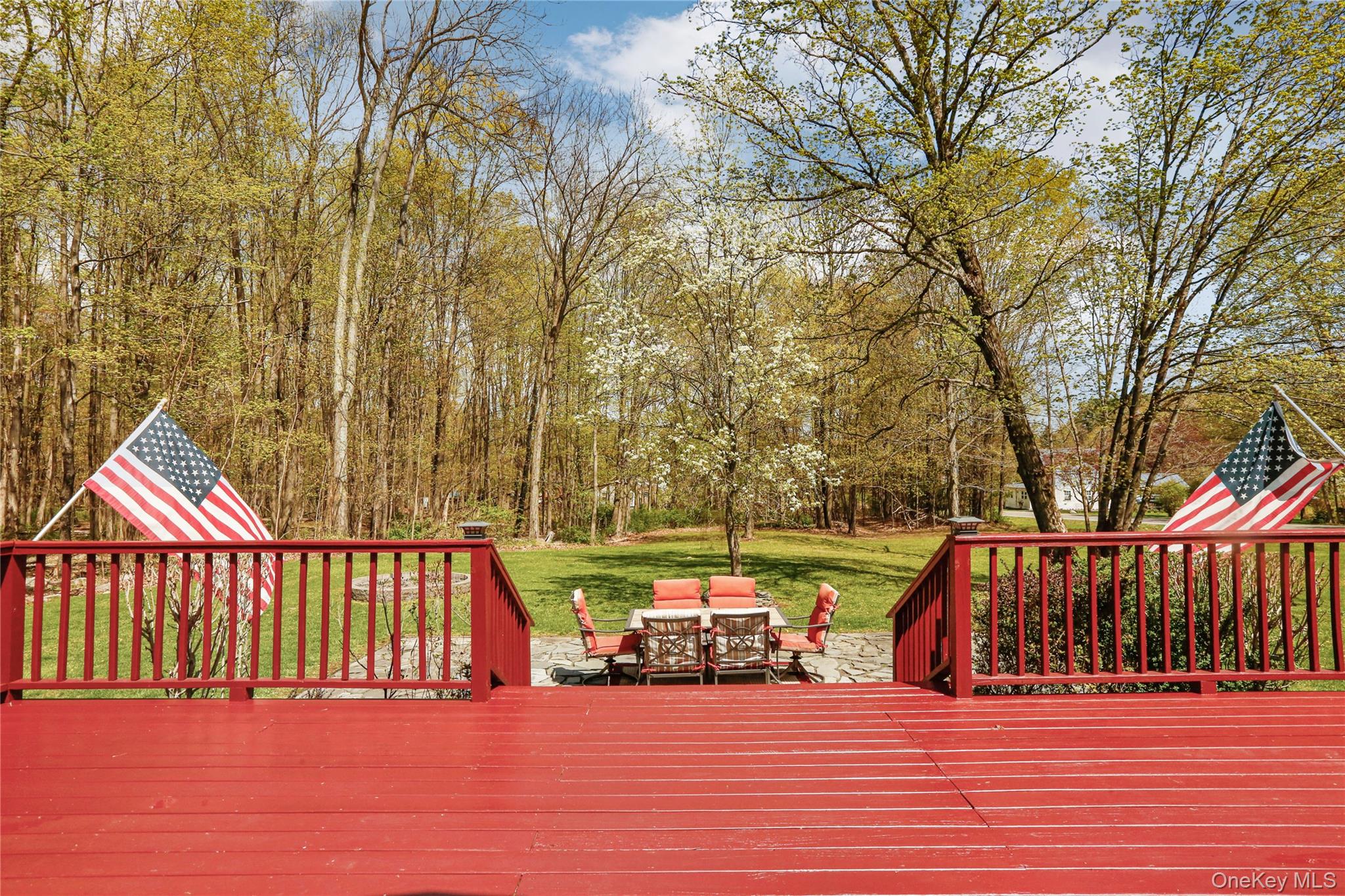 650 Granite Road Kerhonkson, NY 12446 - Photo 22 of 38 a view of a house with a deck and a yard