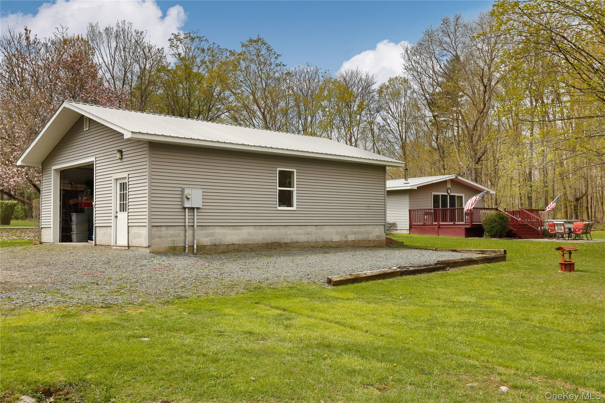 650 Granite Road Kerhonkson, NY 12446 - Photo 28 of 38 a backyard of a house with yard and trampoline