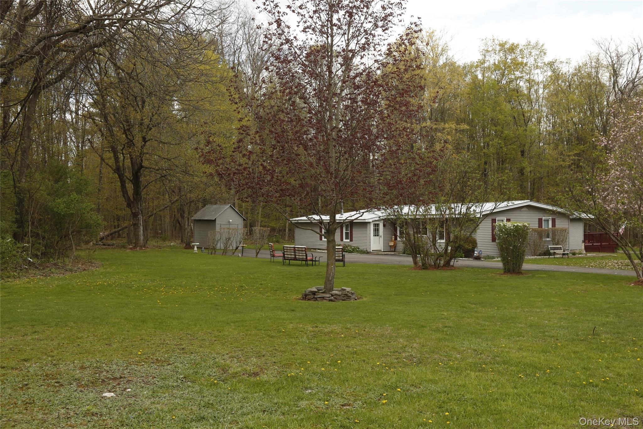 650 Granite Road Kerhonkson, NY 12446 - Photo 37 of 38 a house with swimming pool in front of it