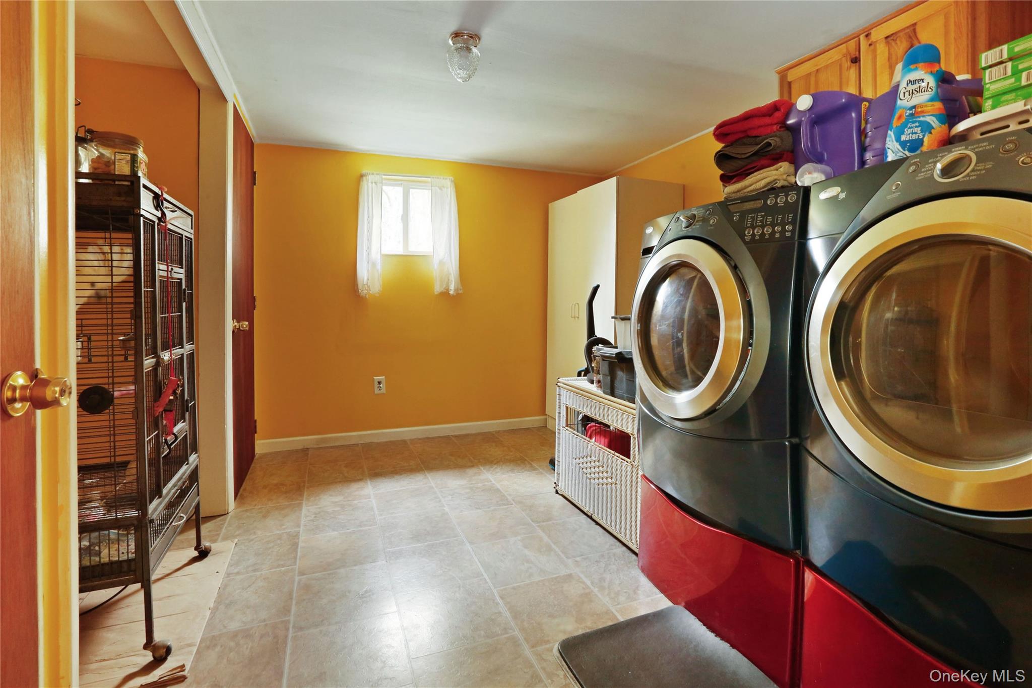 650 Granite Road Kerhonkson, NY 12446 - Photo 7 of 38 a utility room with dryer and washer