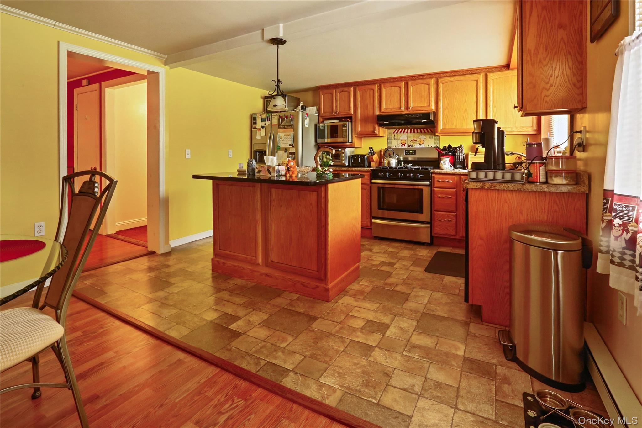 650 Granite Road Kerhonkson, NY 12446 - Photo 9 of 38 a kitchen with stainless steel appliances granite countertop a stove a sink and a refrigerator