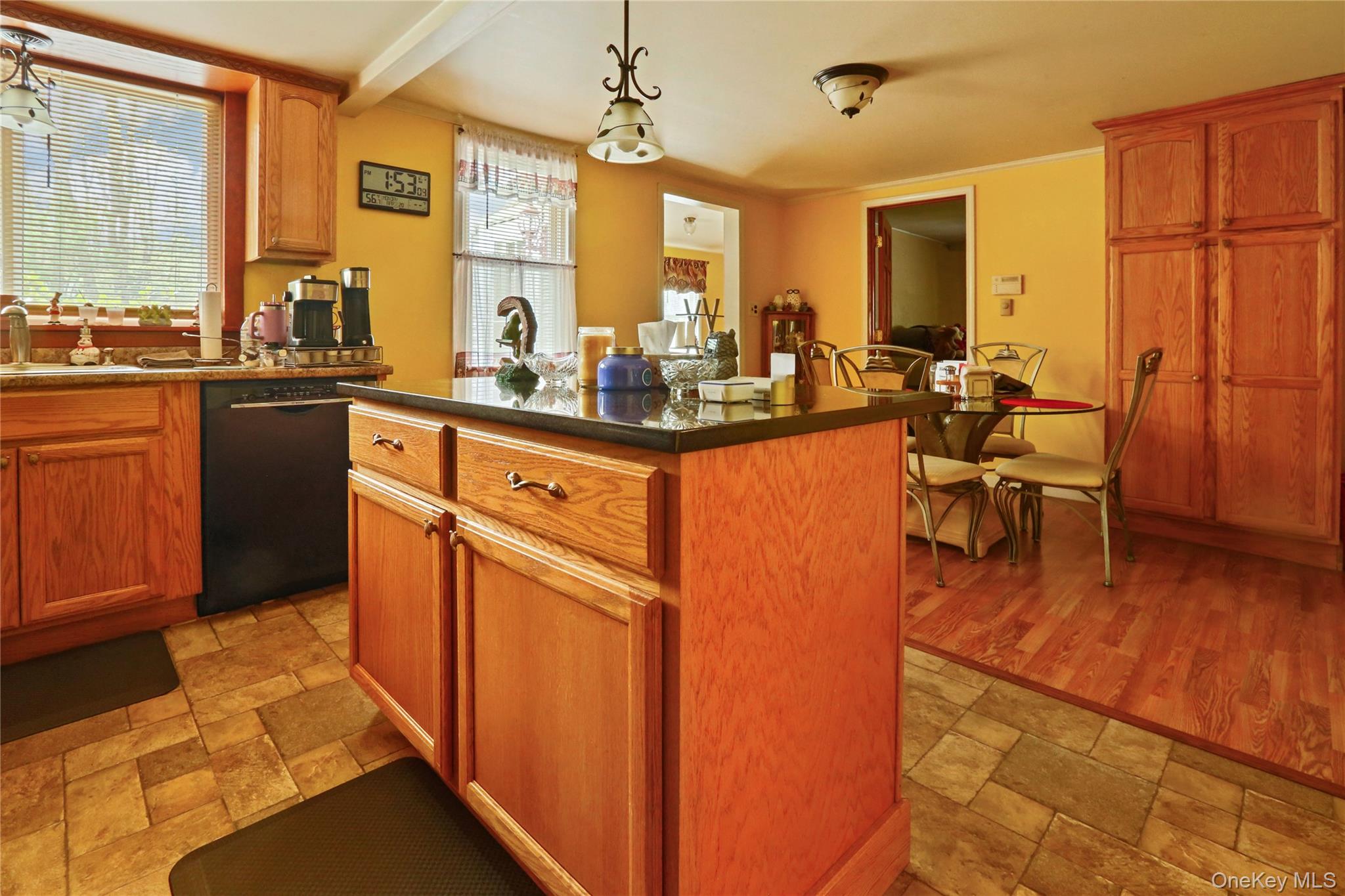 650 Granite Road Kerhonkson, NY 12446 - Photo 10 of 38 a kitchen with stainless steel appliances granite countertop sink stove and wooden cabinets