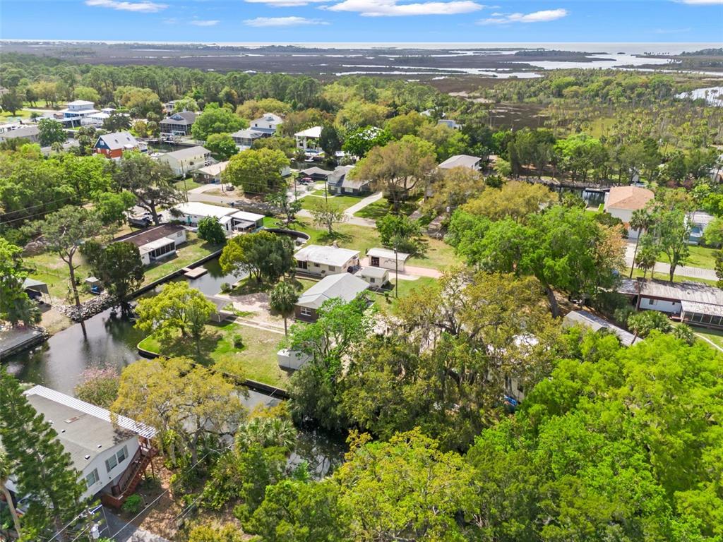 Teal Drive Weeki Wachee, FL 34607 - Photo 18 of 18 a view of a city with mountain view