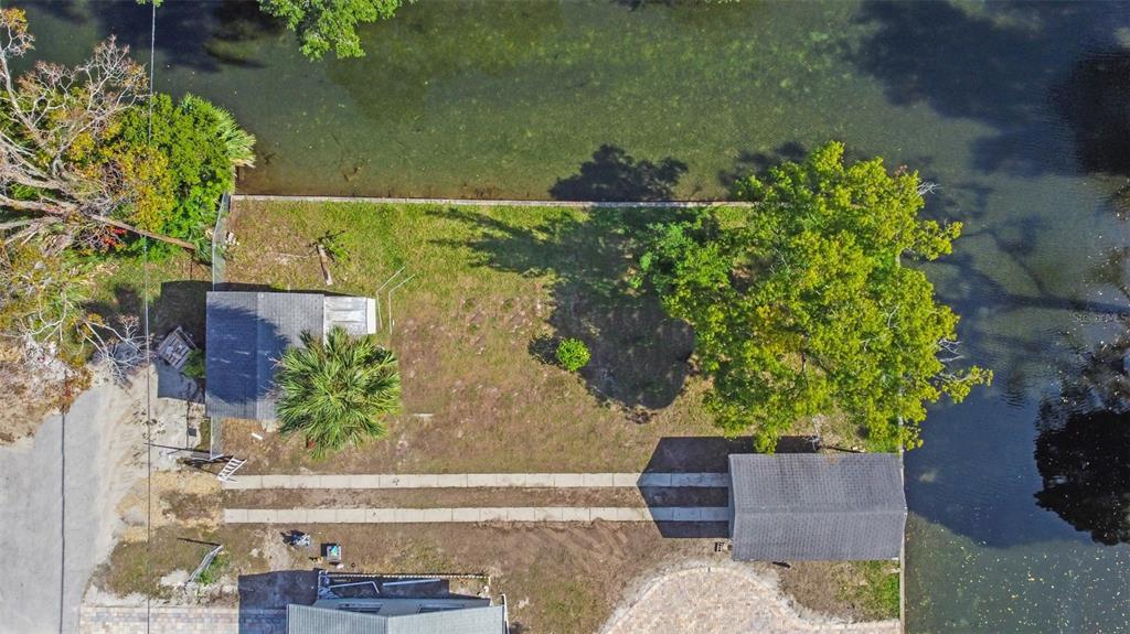 Teal Drive Weeki Wachee, FL 34607 - Photo 5 of 18 an outdoor view with seating space