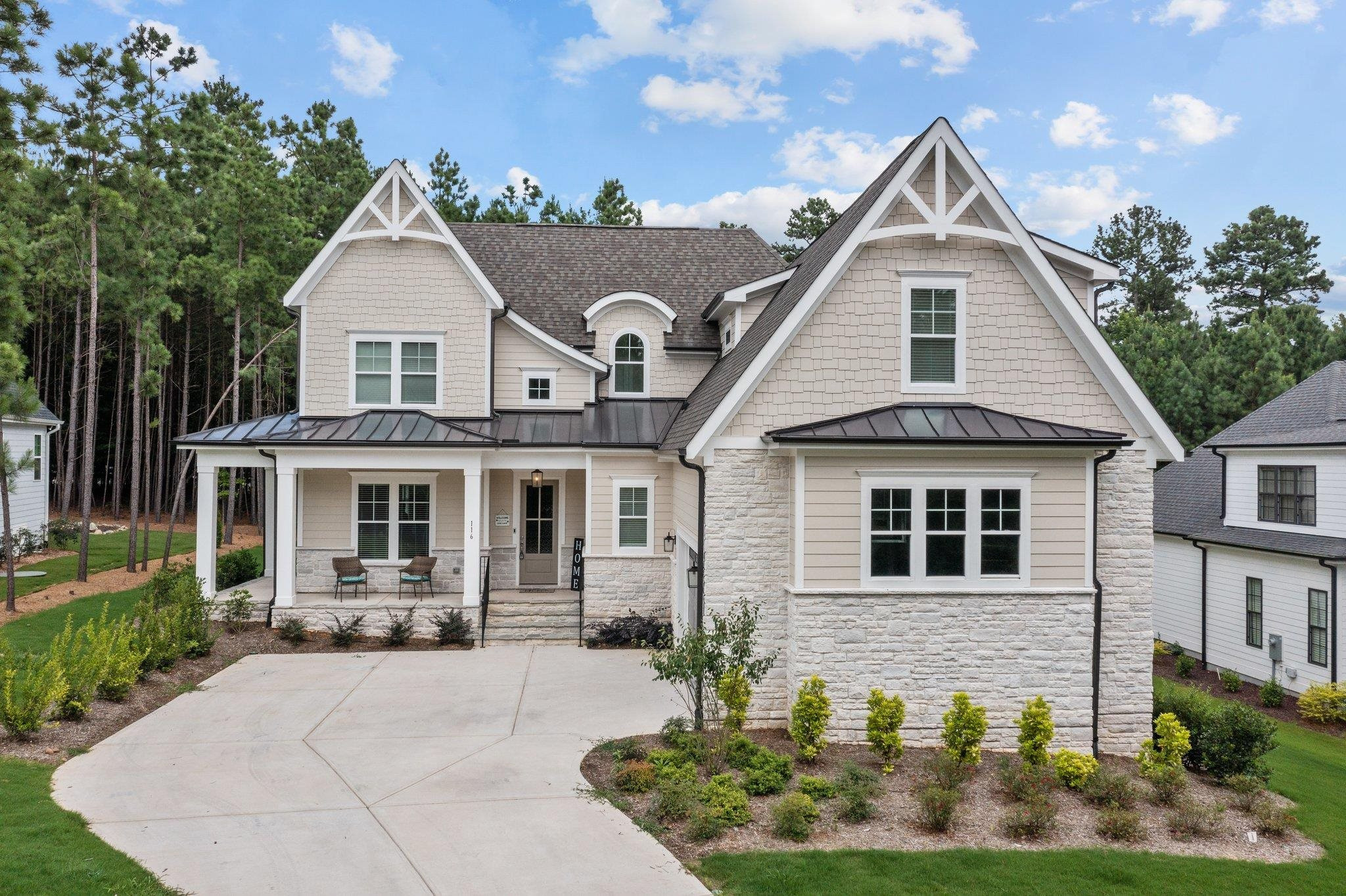 116 Brandy Mill Pittsboro, NC 27312 - Photo 1 of 47 a front view of a house with garden