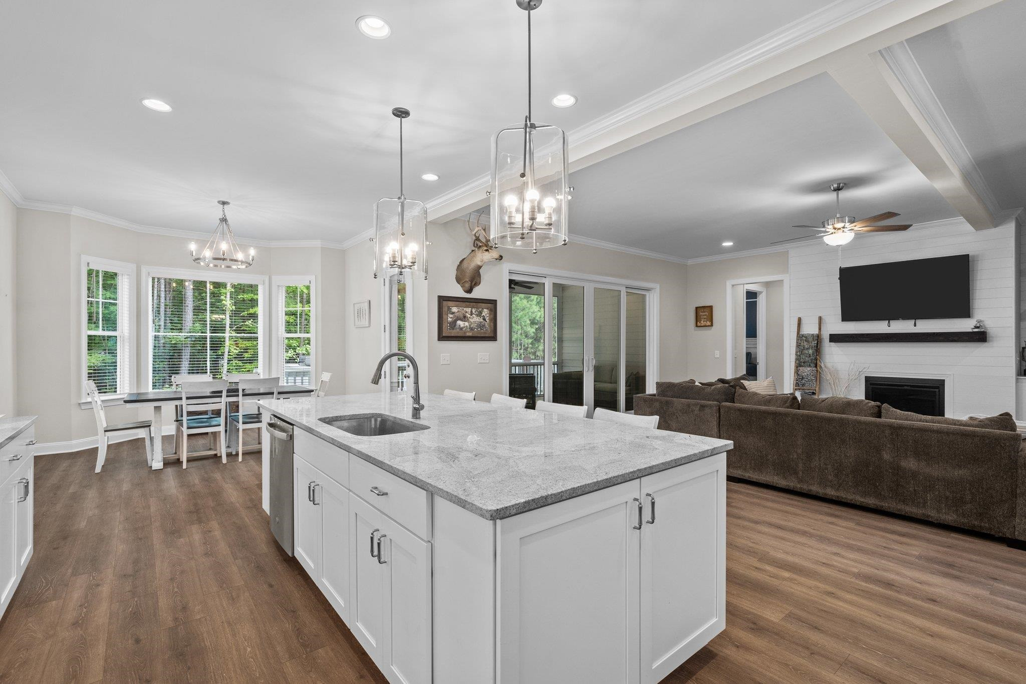 116 Brandy Mill Pittsboro, NC 27312 - Photo 16 of 47 a open kitchen with stainless steel appliances granite countertop a sink stove and wooden floor