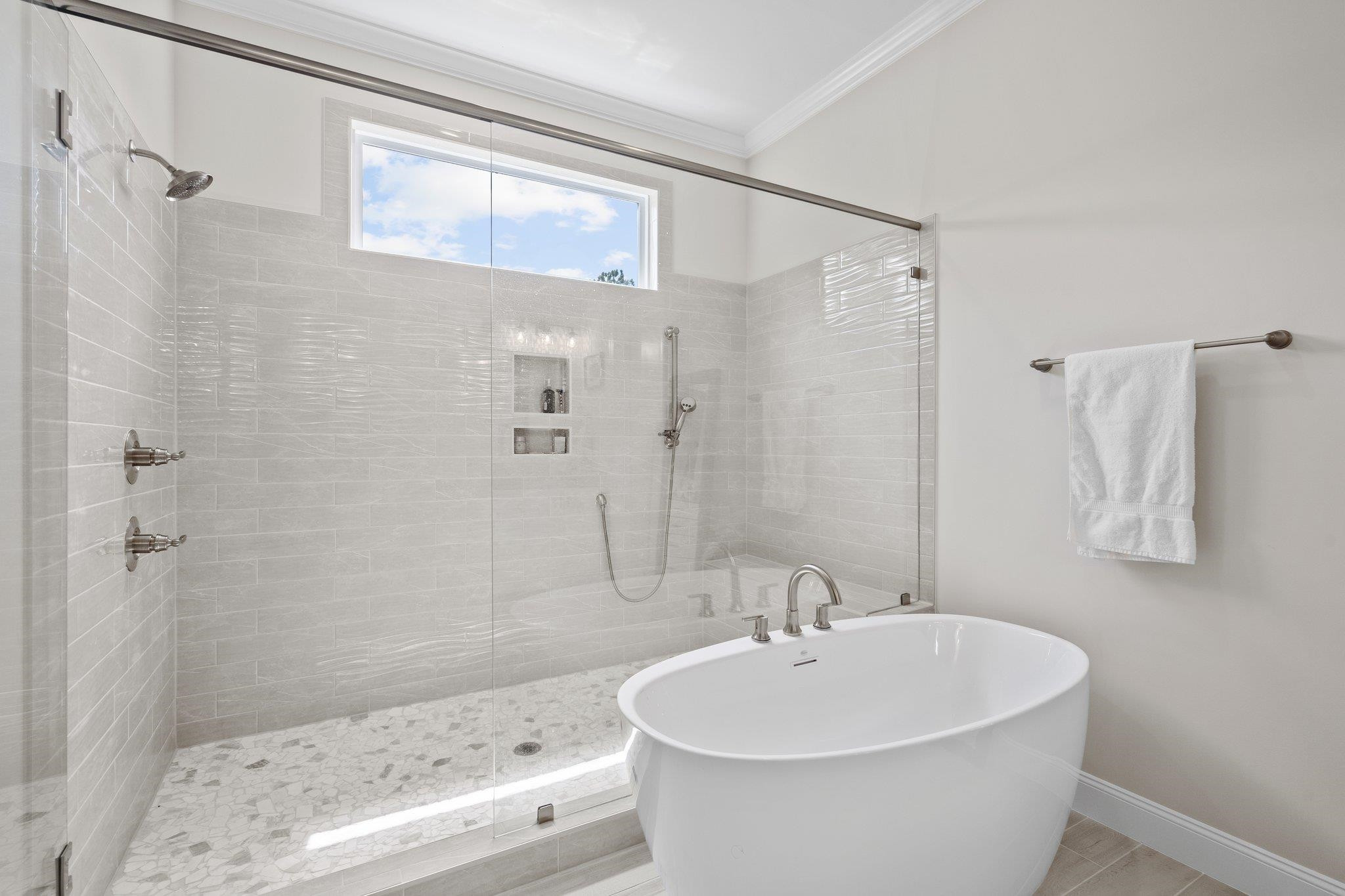 116 Brandy Mill Pittsboro, NC 27312 - Photo 22 of 47 a white bath tub sitting next to a white sink and vanity