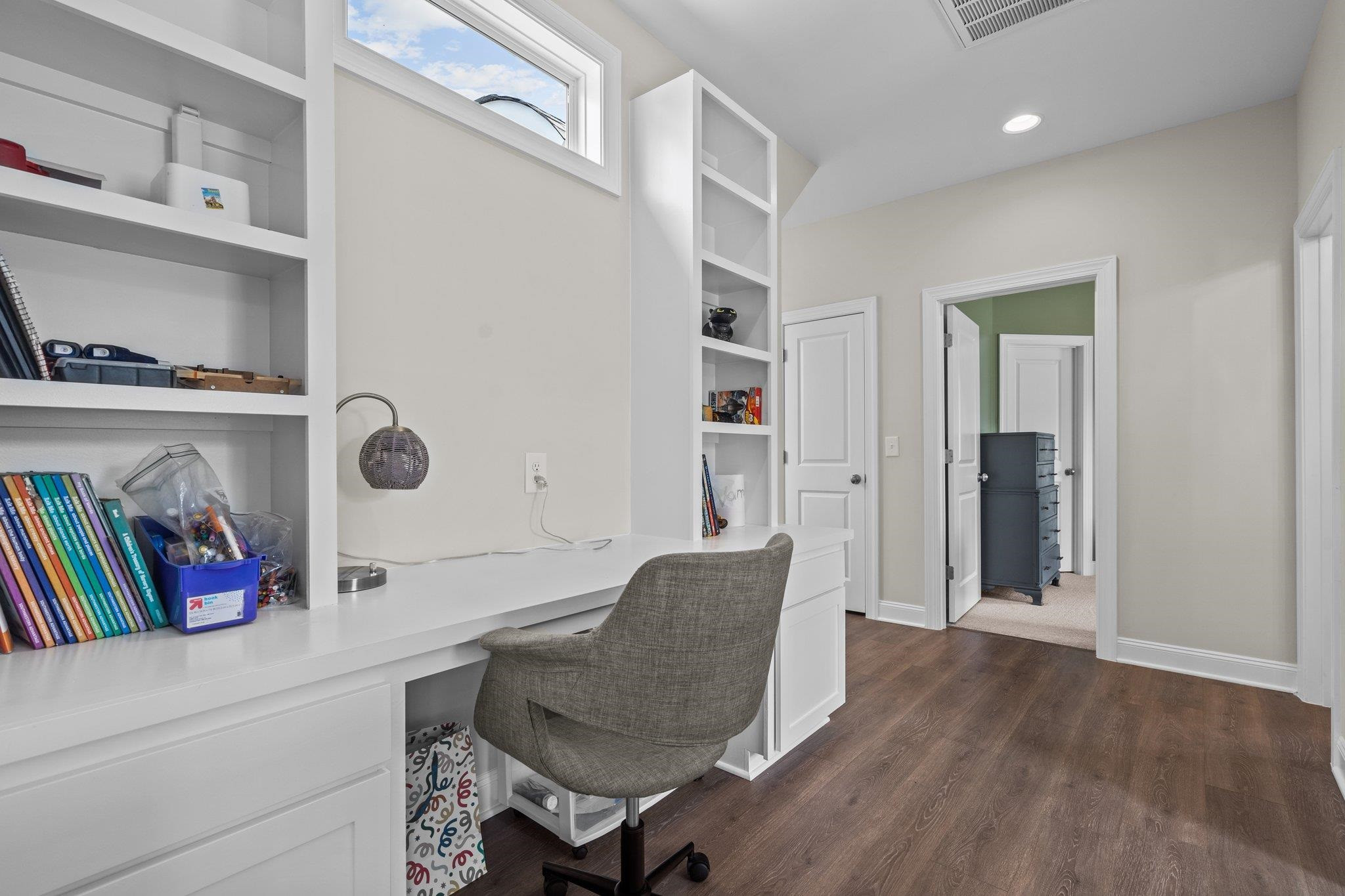 116 Brandy Mill Pittsboro, NC 27312 - Photo 28 of 47 a living room with furniture and a book shelf