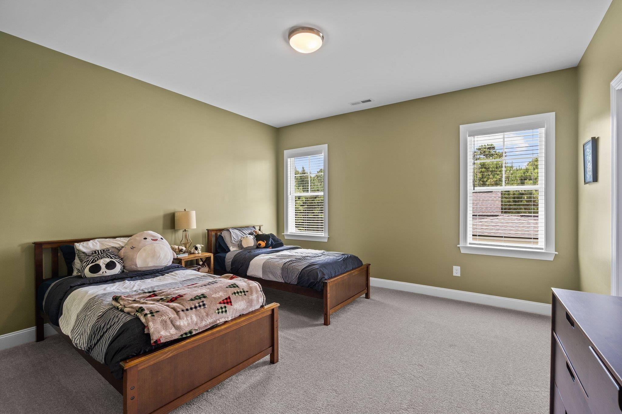 116 Brandy Mill Pittsboro, NC 27312 - Photo 30 of 47 a bedroom with two beds and a window
