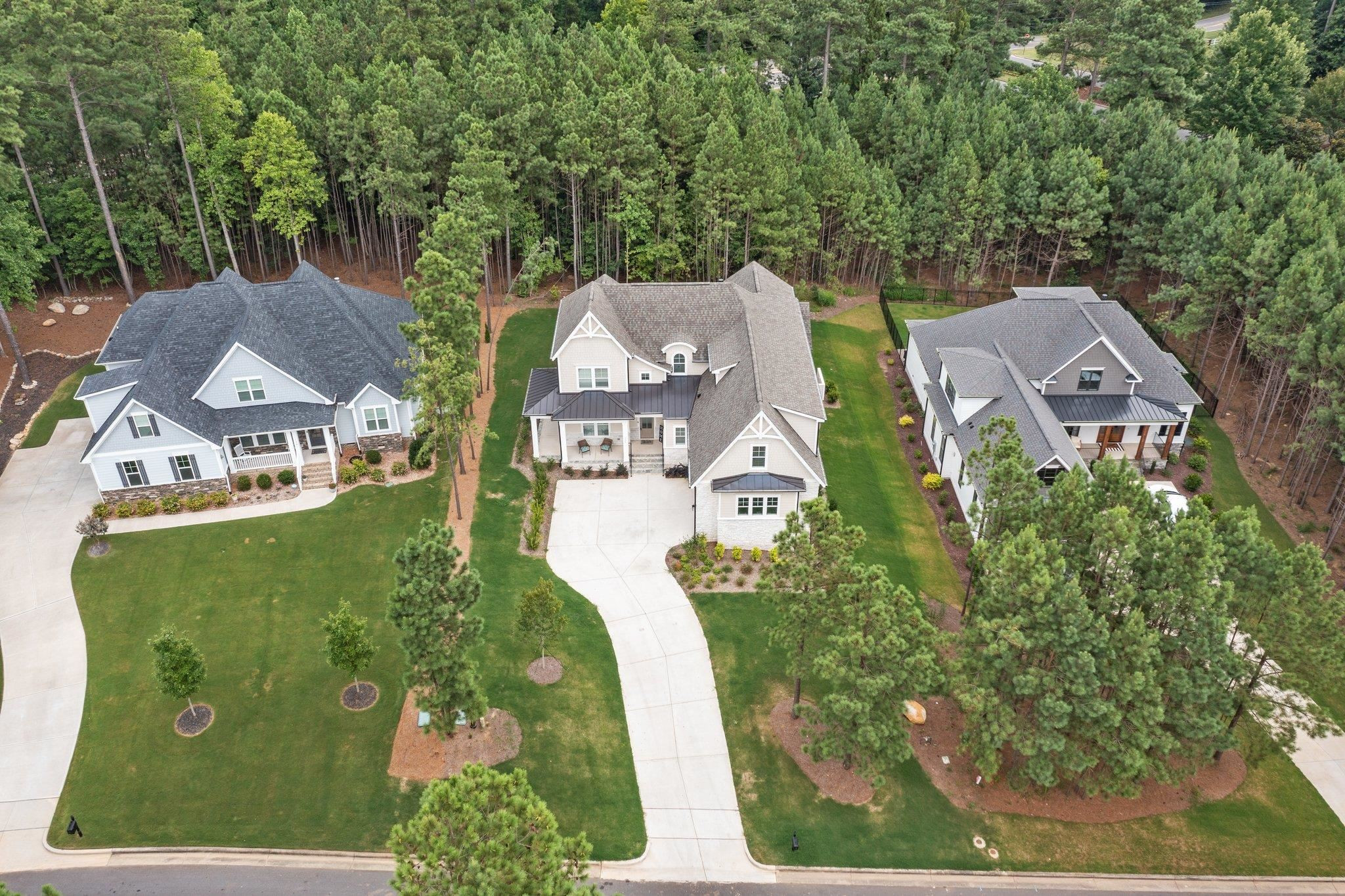 116 Brandy Mill Pittsboro, NC 27312 - Photo 37 of 47 an aerial view of a house with garden space and street view