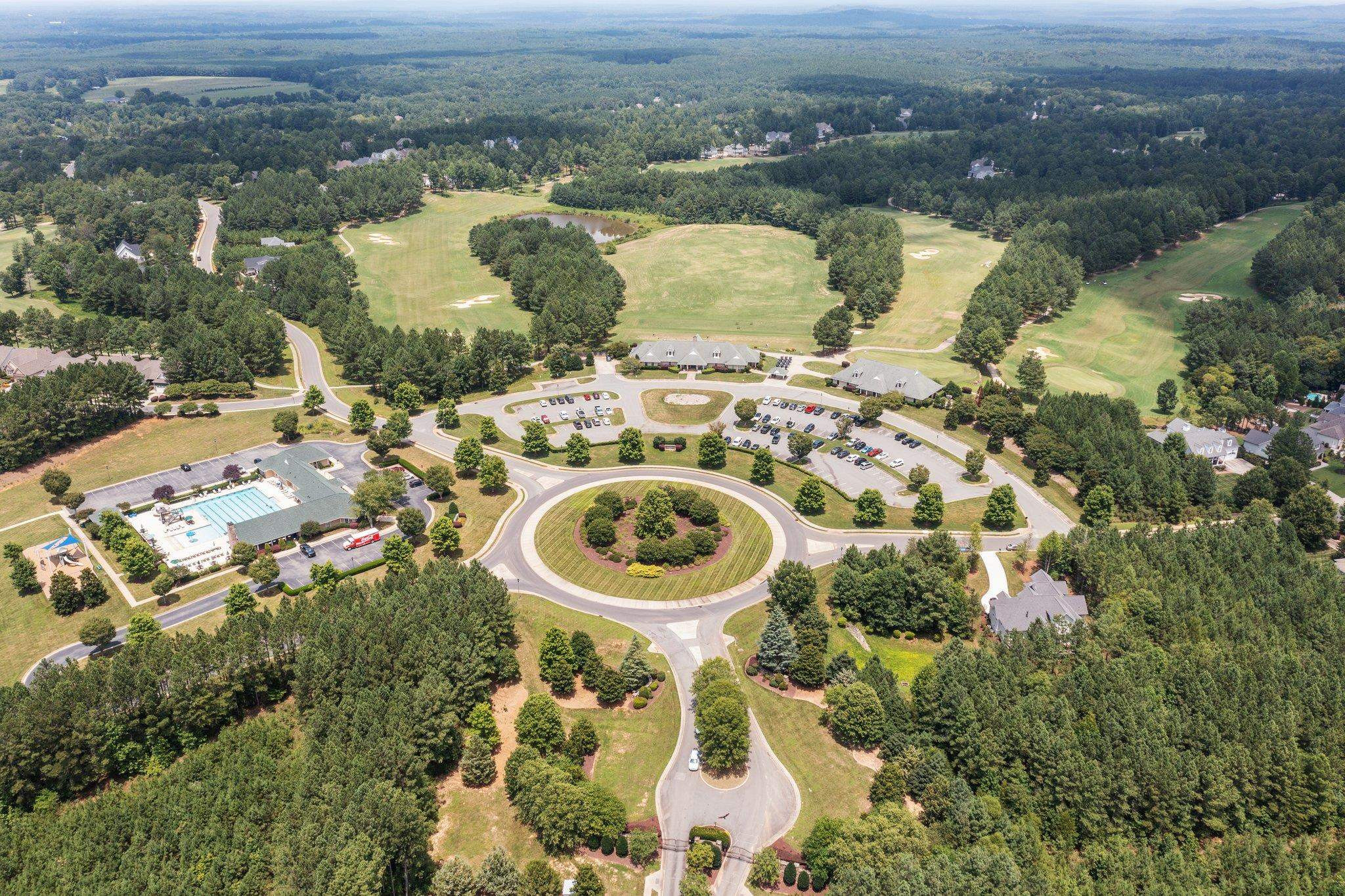 116 Brandy Mill Pittsboro, NC 27312 - Photo 46 of 47 an aerial view of a house with outdoor space swimming pool and lake view