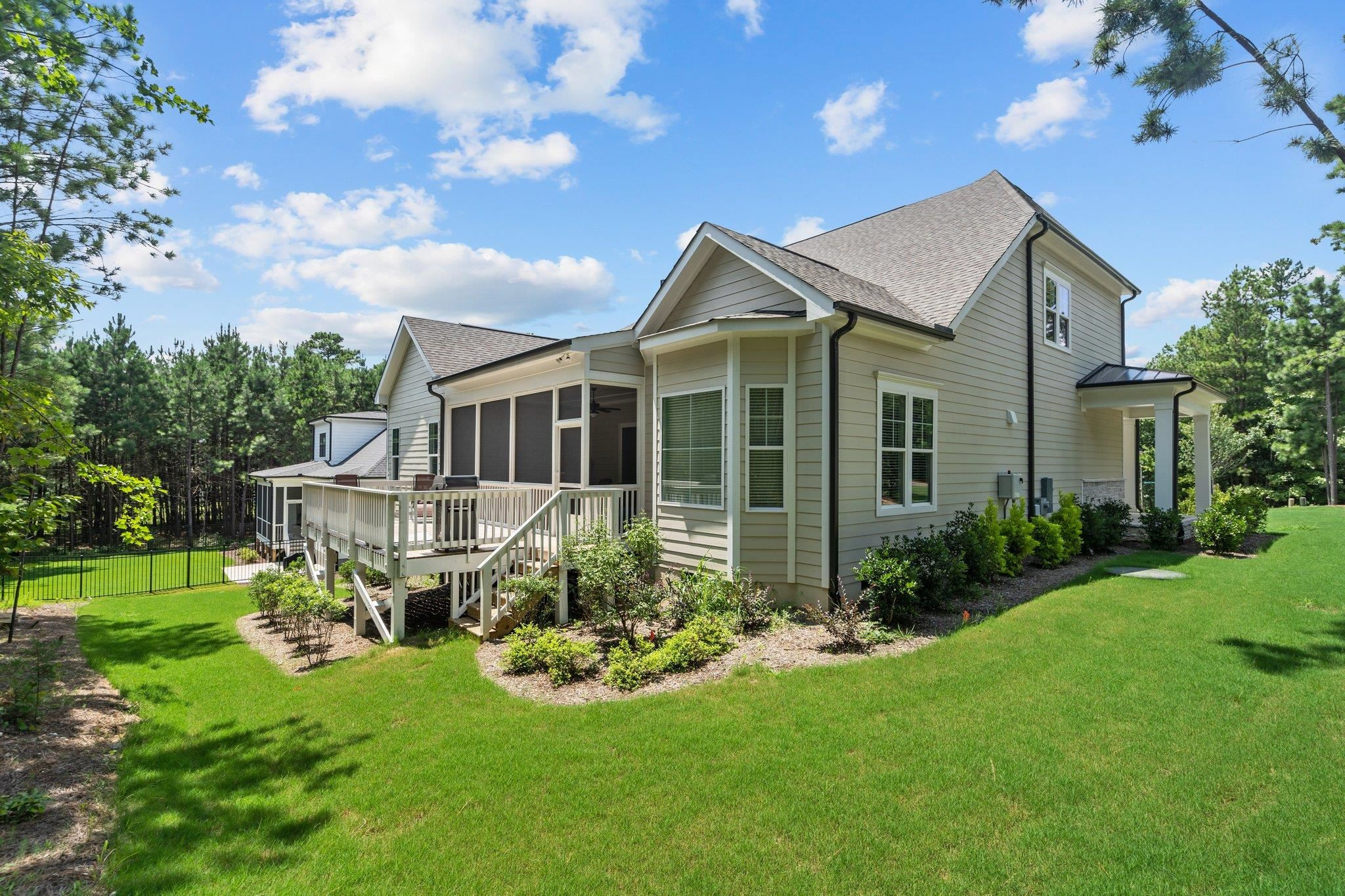 116 Brandy Mill Pittsboro, NC 27312 - Photo 5 of 47 a front view of a house with a yard table and chairs